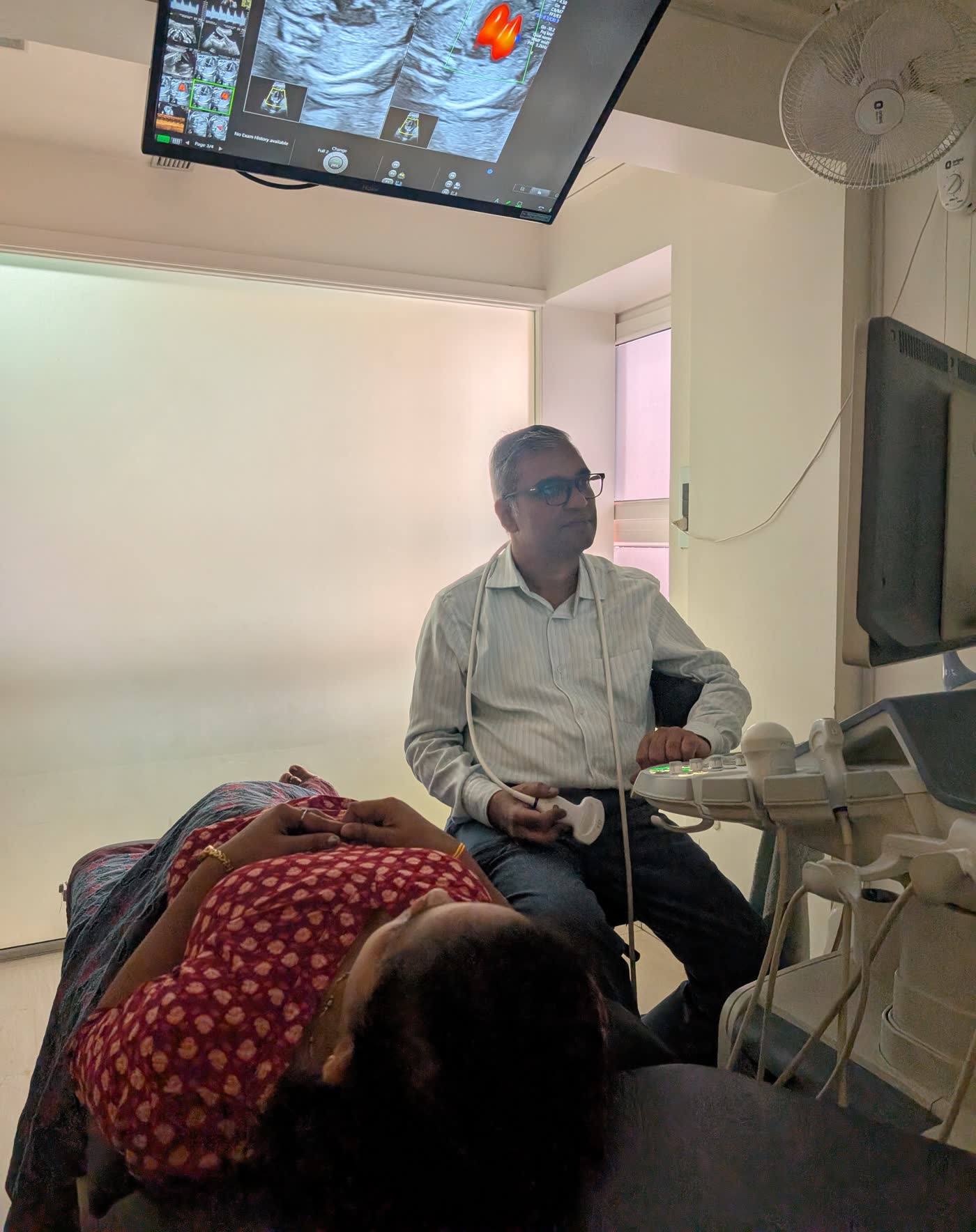 Dr. Sandeep Pansare performing an ultrasound examination at the centre