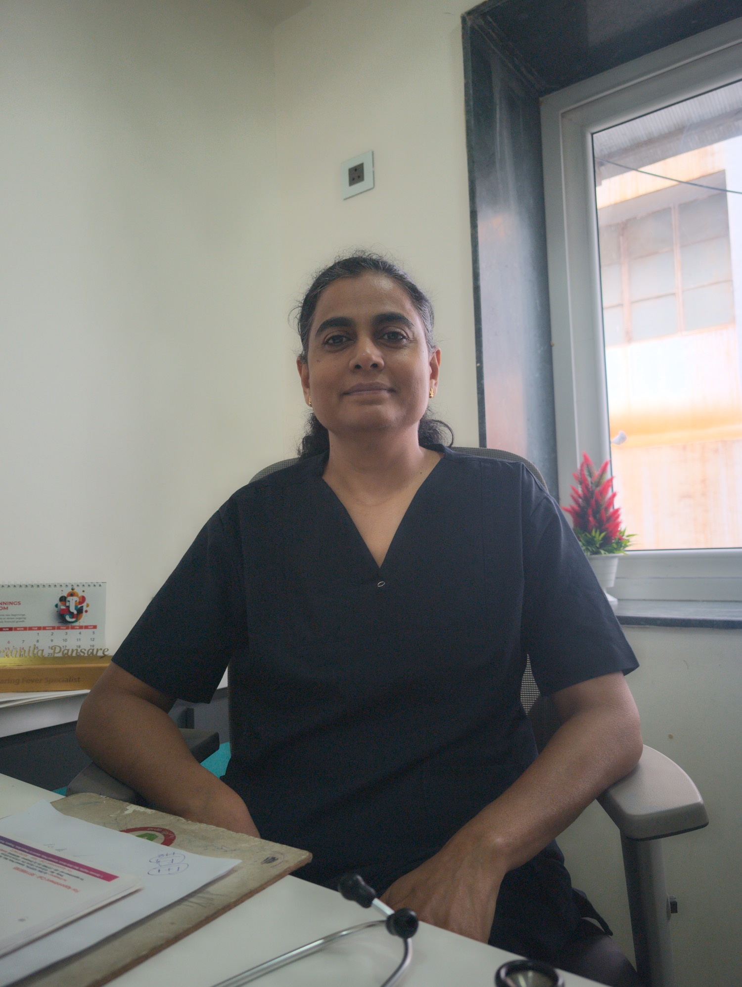 Dr. Pramila Sandeep Pansare at her consulting desk at the centre