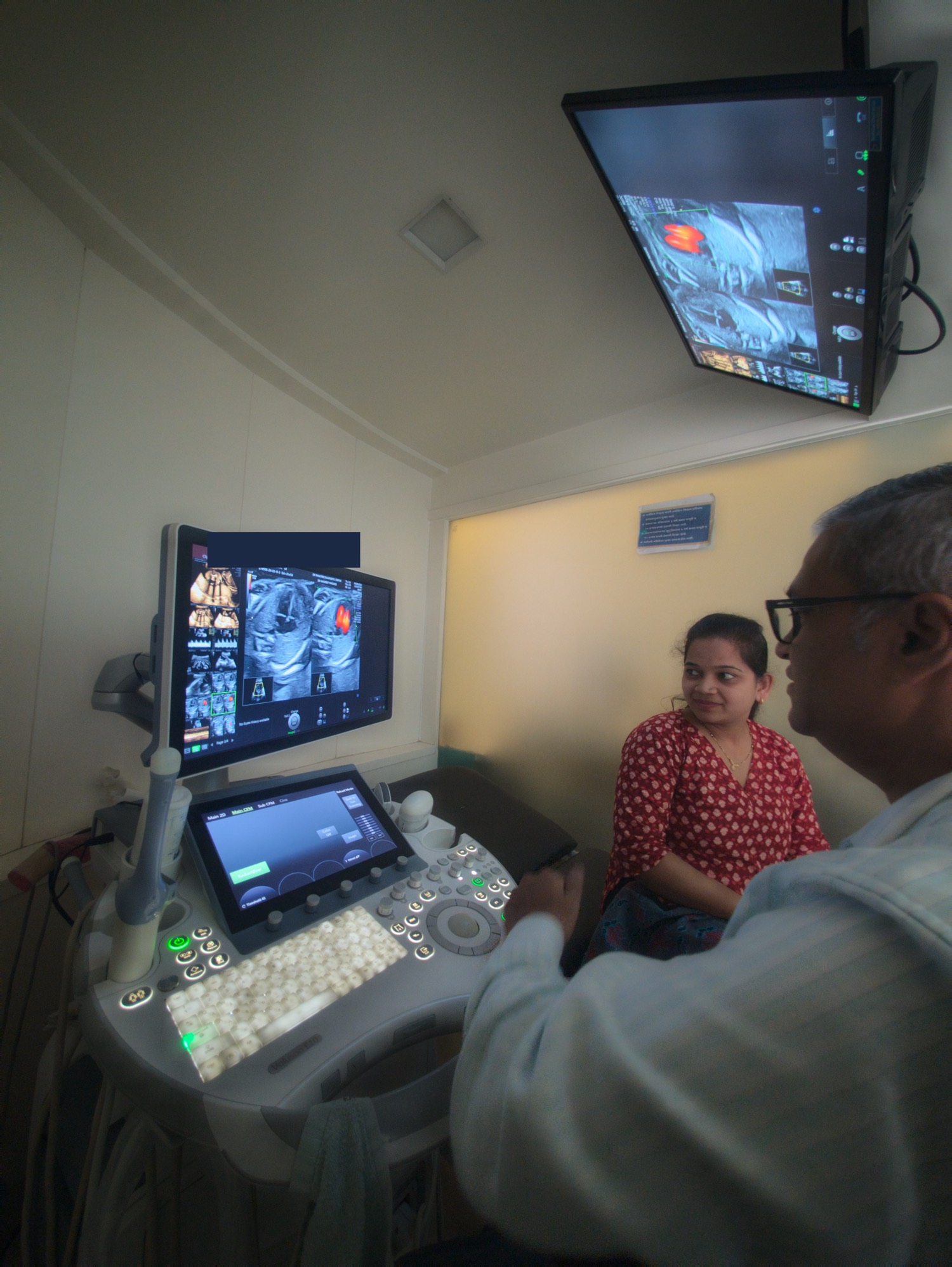 Dr. Sandeep Pansare performing an examination at the centre