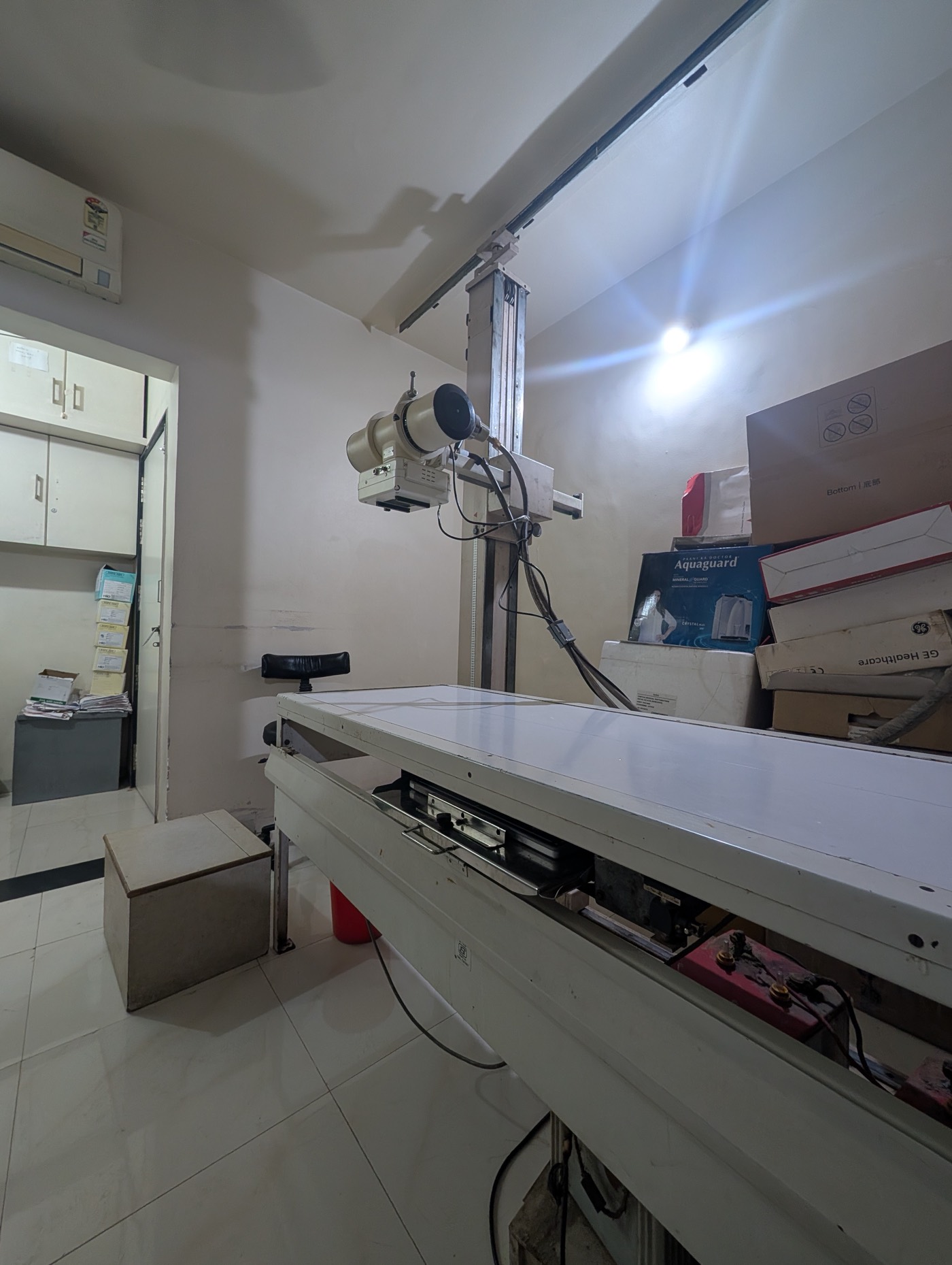 The X-ray table and tube in the radiography room at the centre